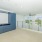 open area upstairs with view through the windows